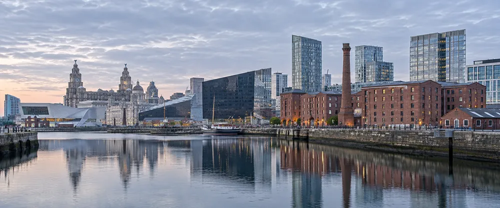 Liverpool waterfront with dock water and industrial buildings